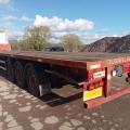 Dennison Tri axle flat trailer